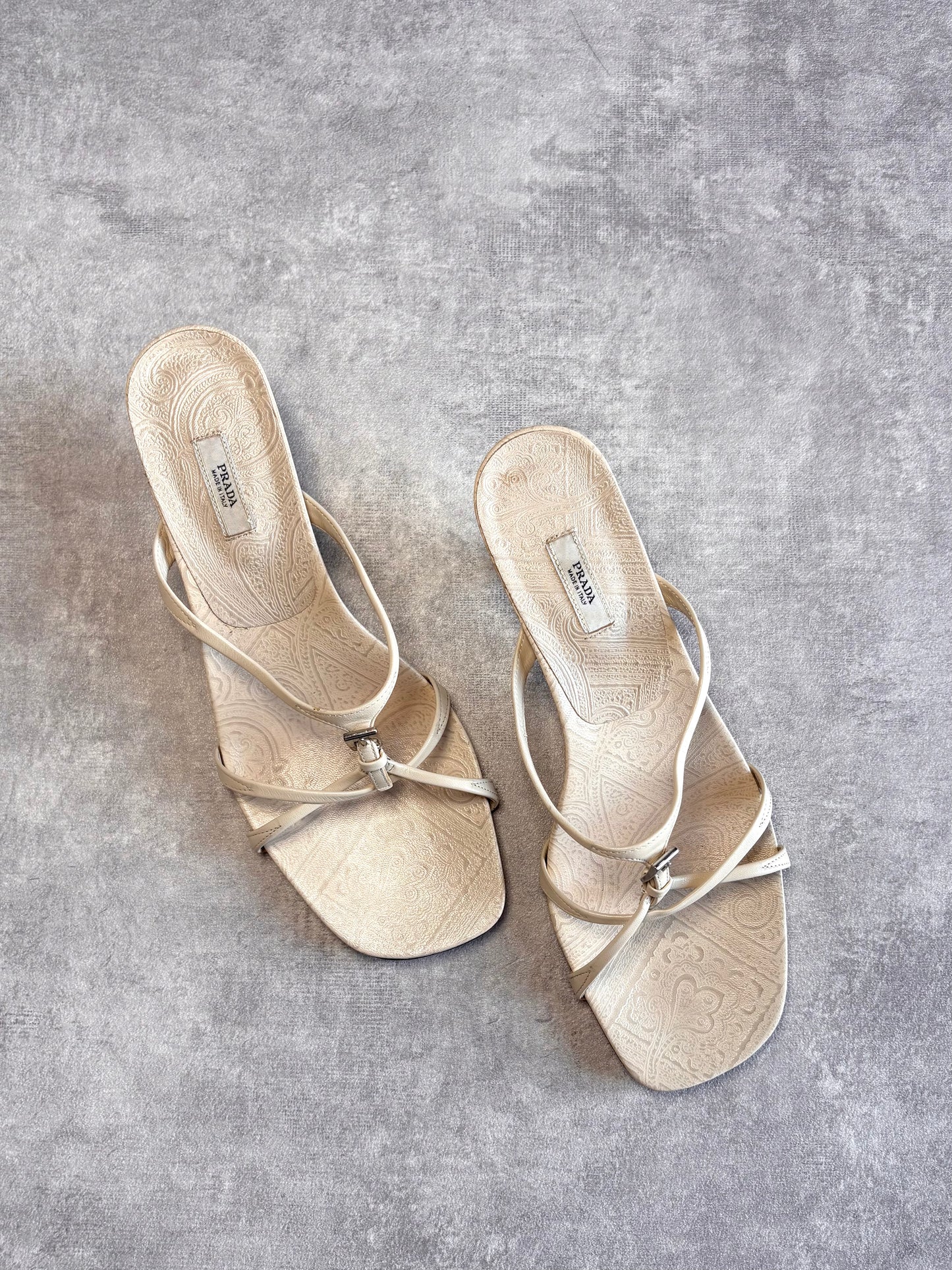 Prada Cream Buckle Mules