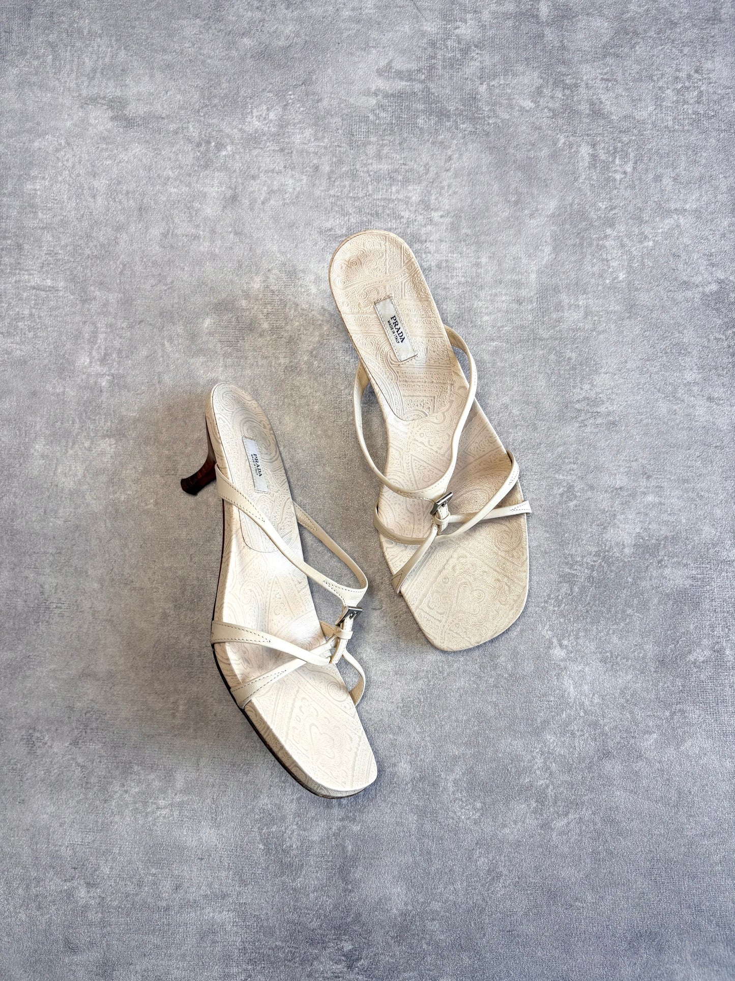 Prada Cream Buckle Mules