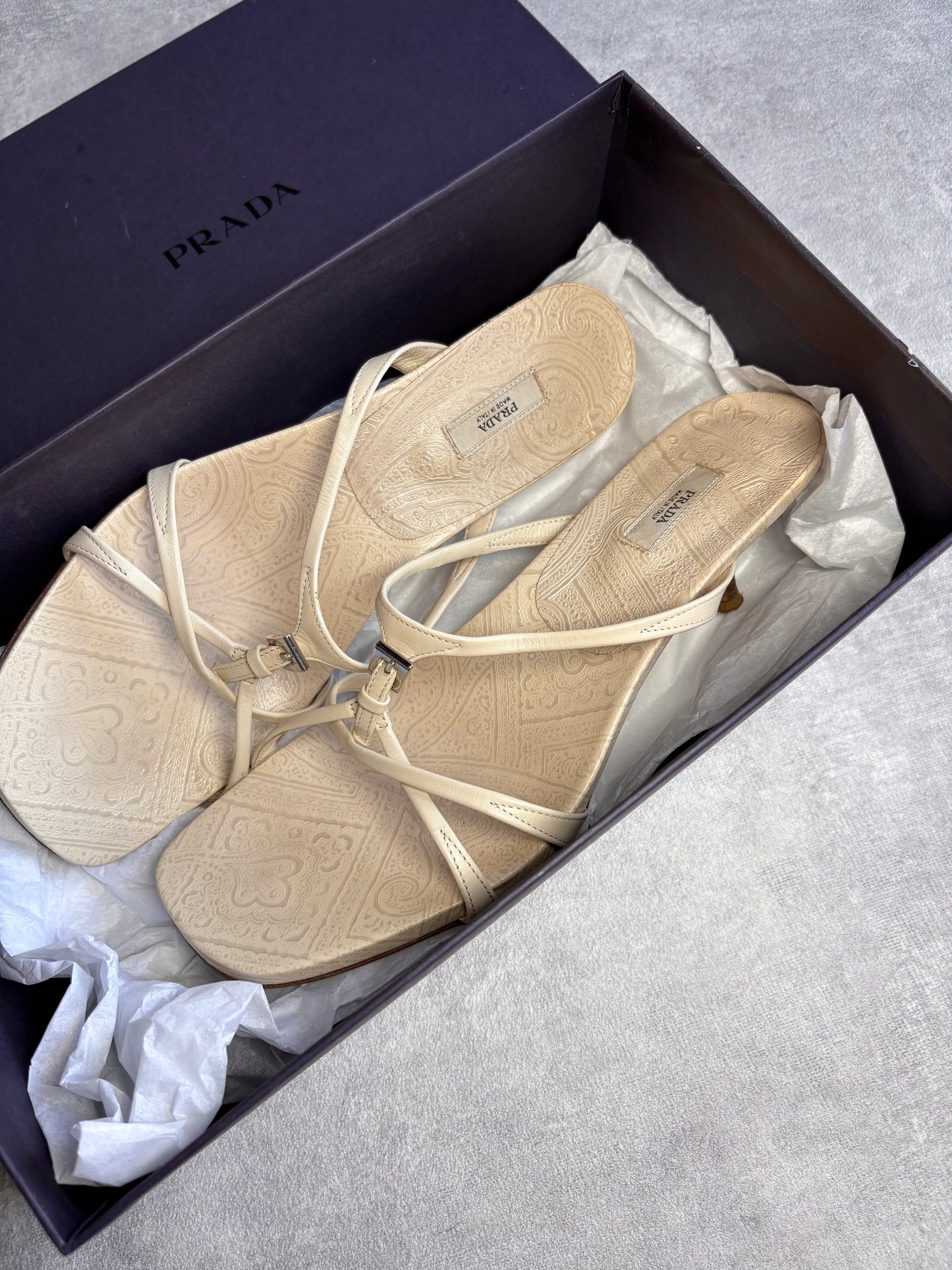 Prada Cream Buckle Mules