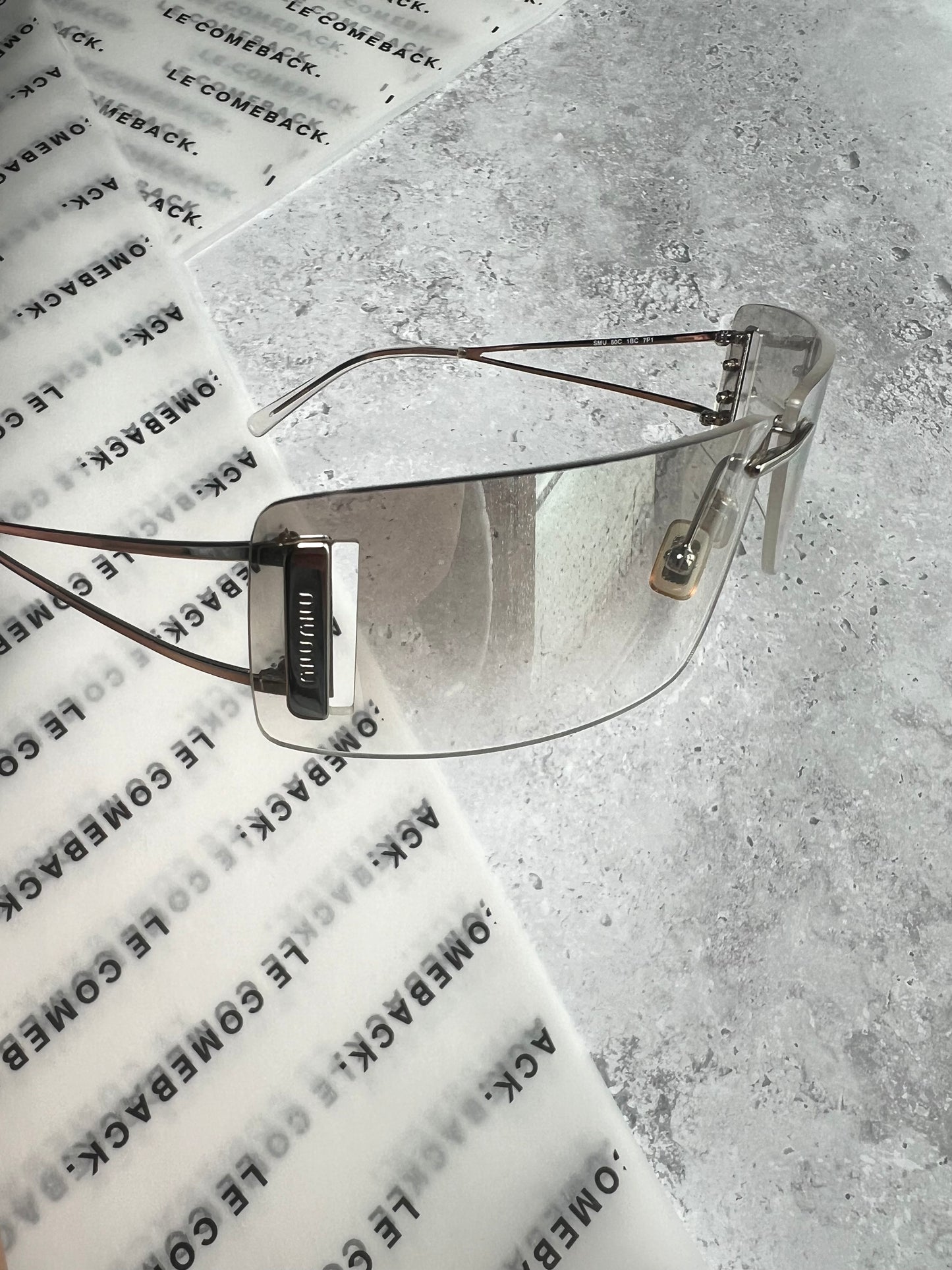 Miu Miu Clear Rimless Sunglasses