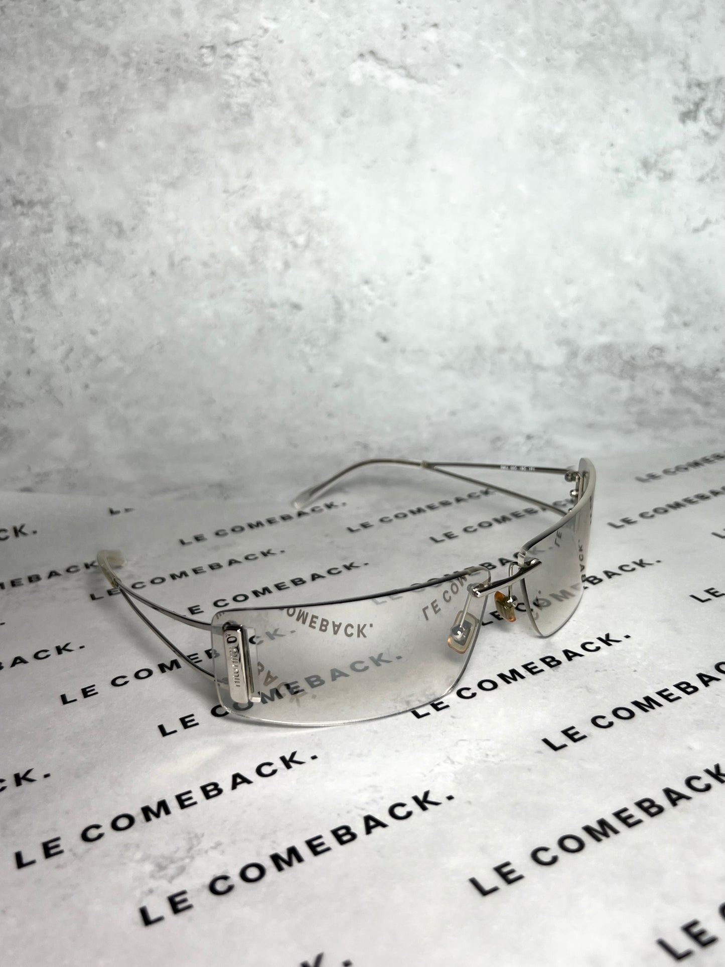 Miu Miu Clear Rimless Sunglasses