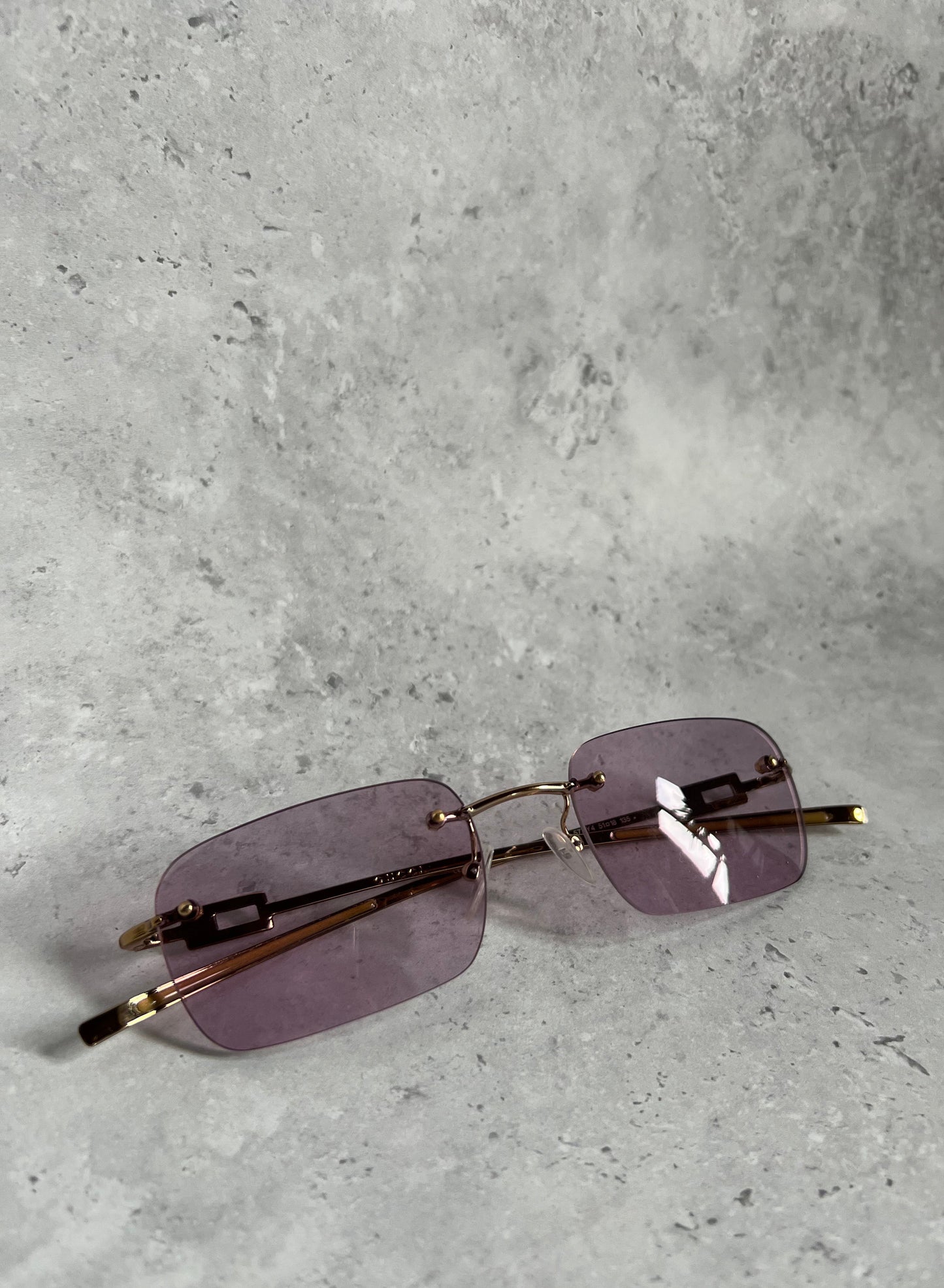 Gucci Pink Rimless Sunglasses