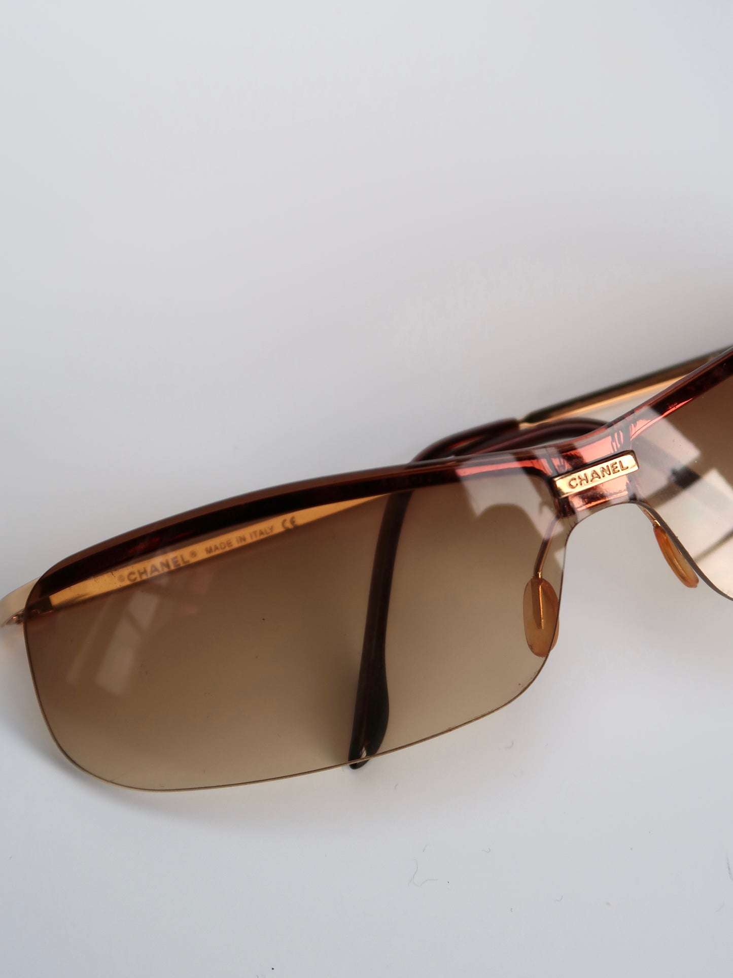 Chanel Brown Rimless Sunglasses