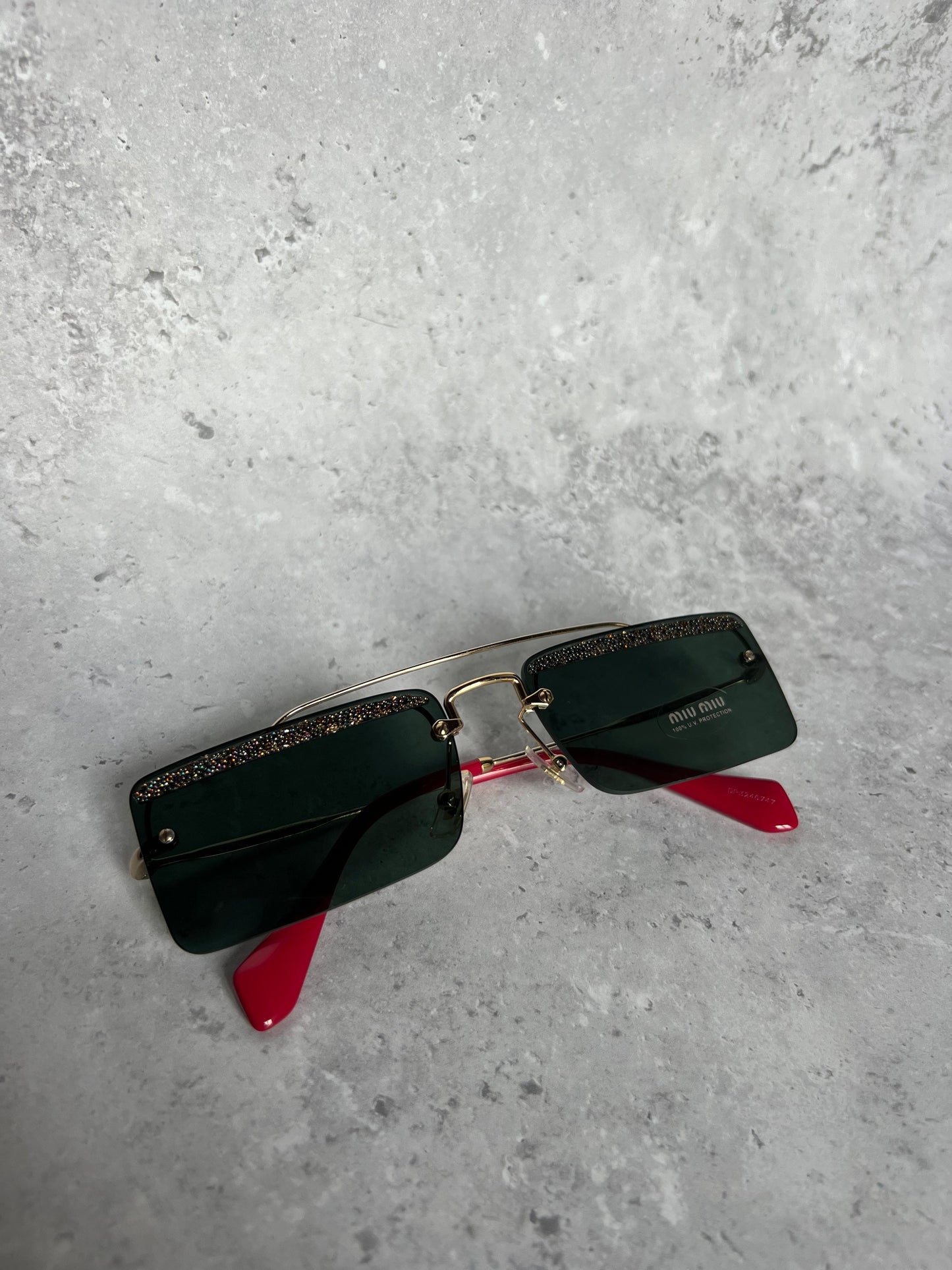 Miu Miu Embellished Rimless Sunglasses