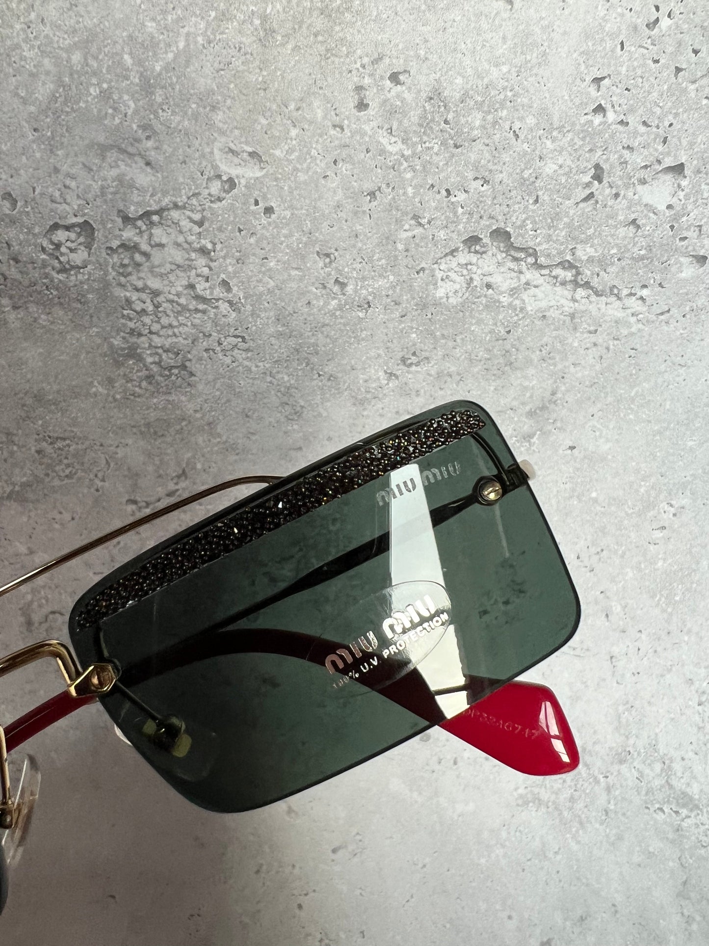 Miu Miu Embellished Rimless Sunglasses