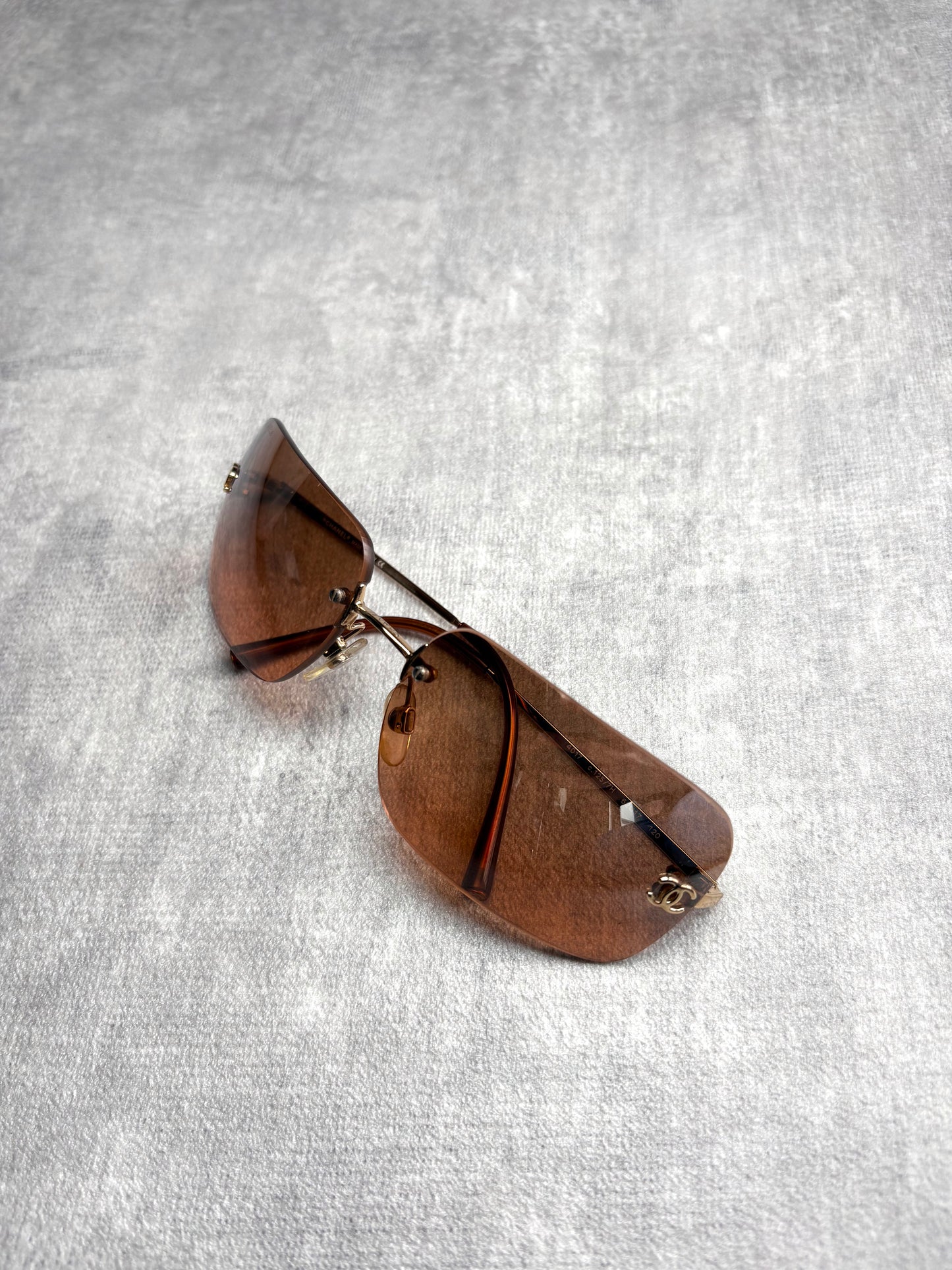 Chanel Brown Rimless Sunglasses